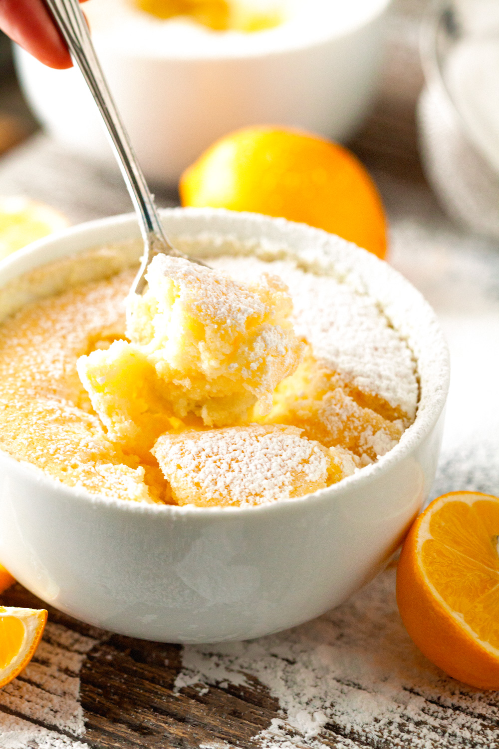Gooey Lemon Soufflé Pudding Cakes via Deliciously Yum!