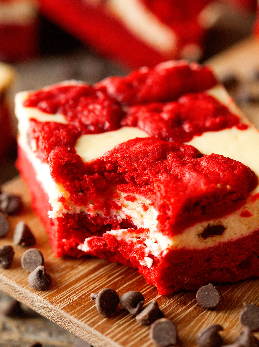 Red Velvet Cheesecake Bars via Deliciously Yum