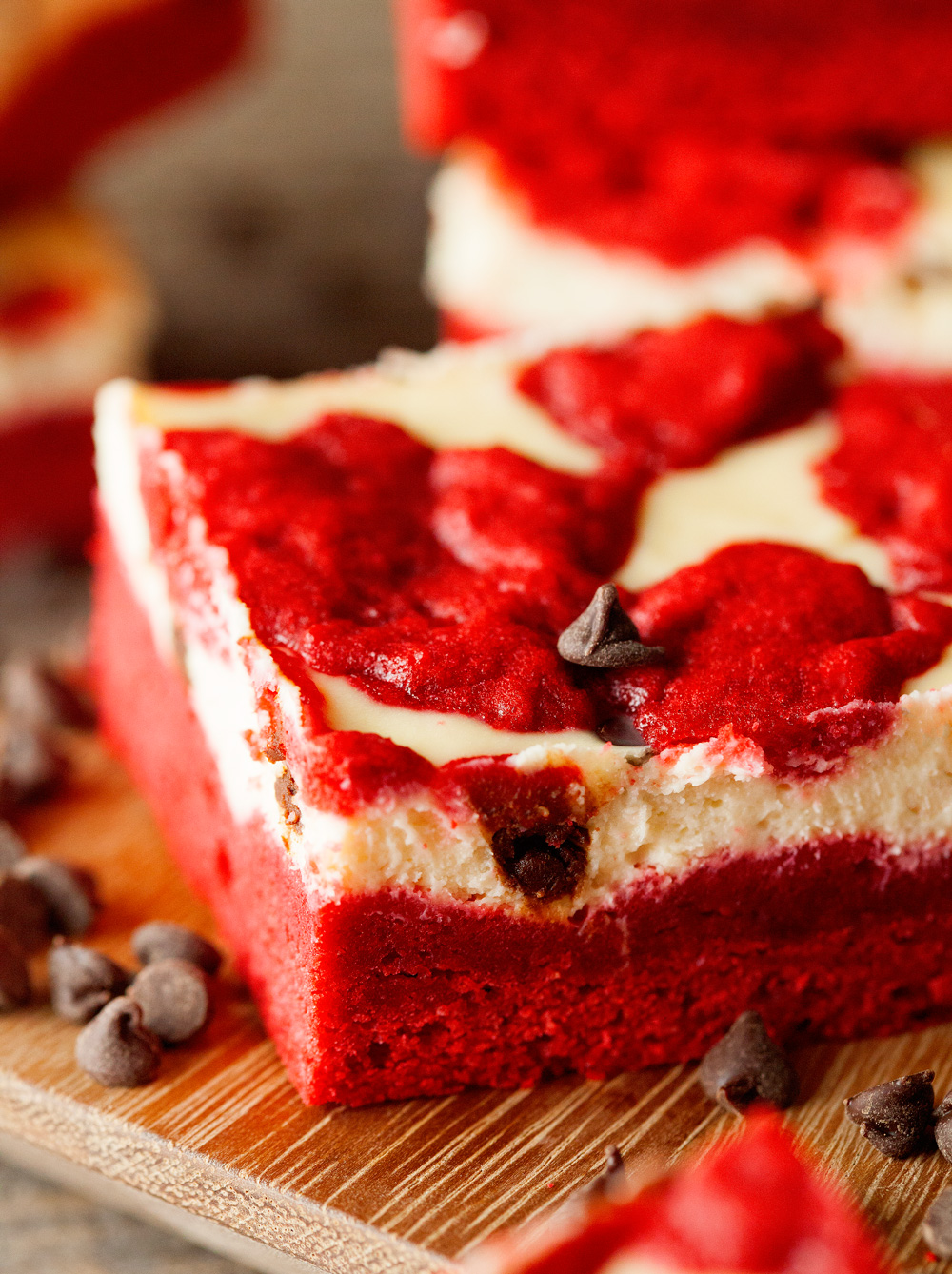 Red Velvet Cheesecake Bars via Deliciously Yum