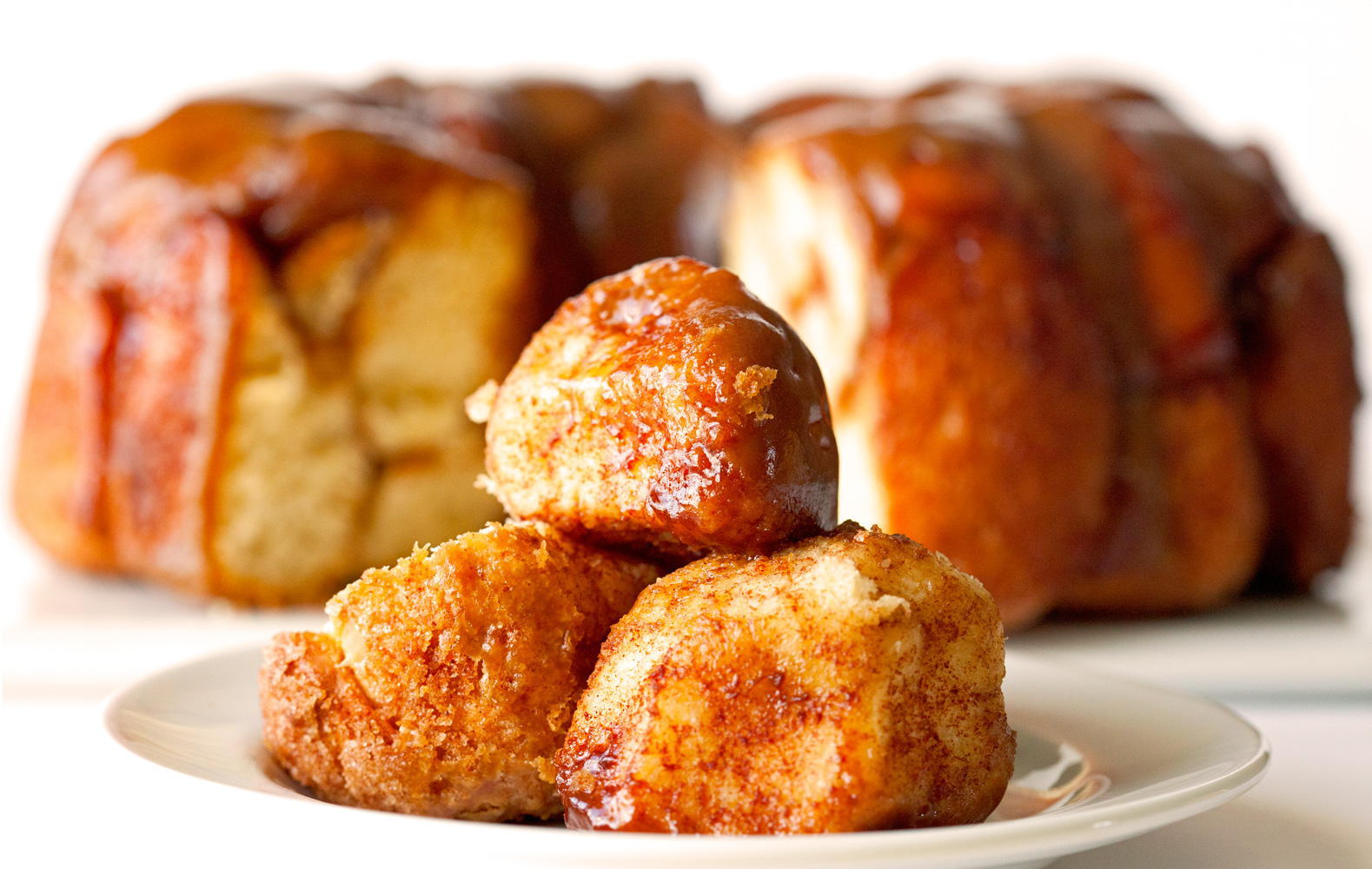 monkey bread with salted caramel sauce, see more at //homemaderecipes.com/cooking-101/10-homemade-bread-recipes/